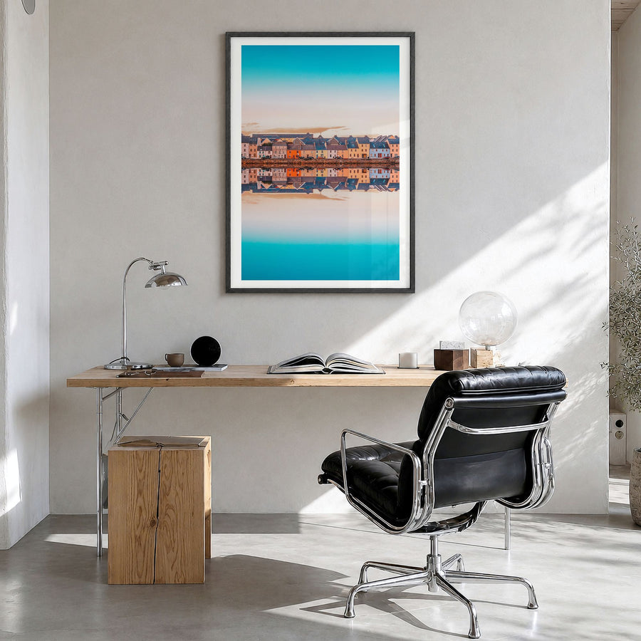 Galway Photo Poster in a black wood frame, hanging in a bright home office, white border