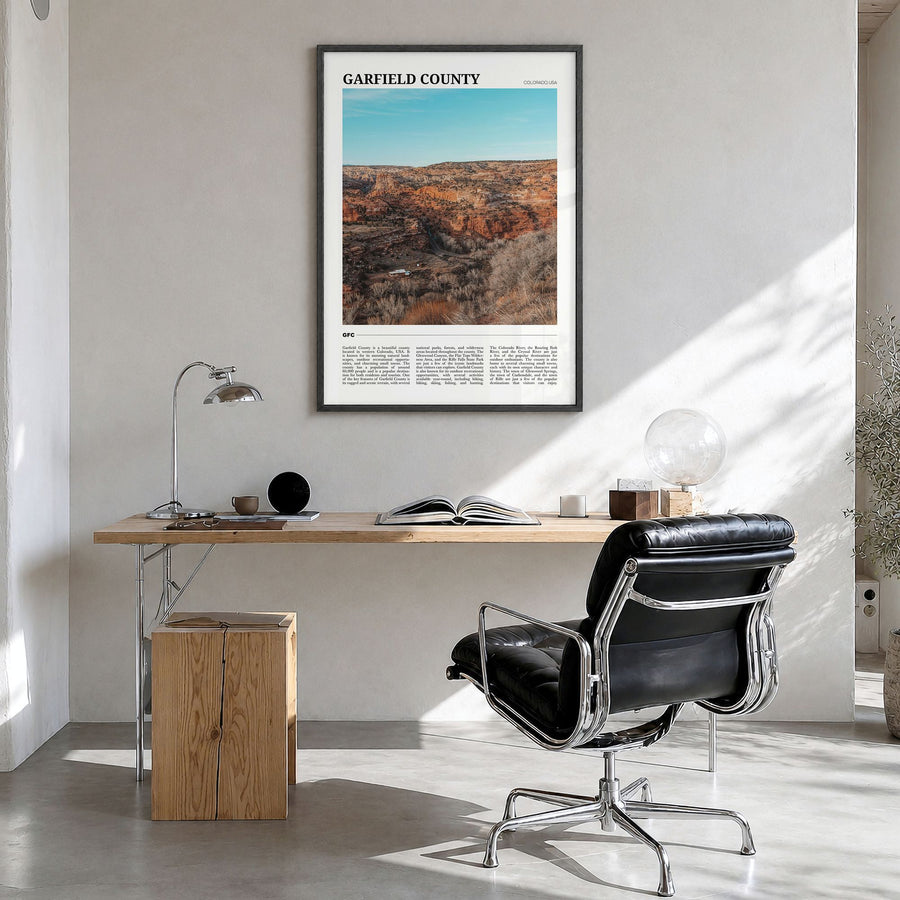 Garfield County Travel Poster in a black wood frame, hanging in a bright home office