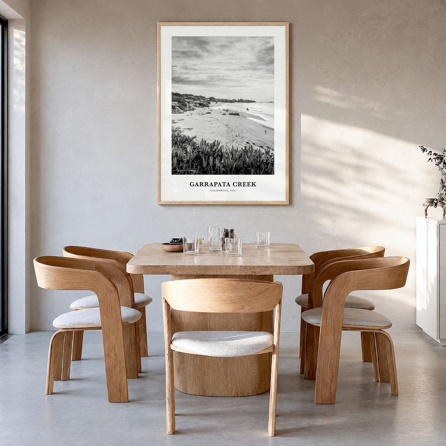 Garrapata Creek Classic Poster in a natural wood frame, hanging in a dining room