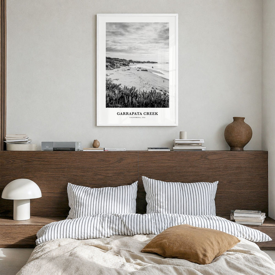 Garrapata Creek Classic Poster in a white wood frame, hanging in a bedroom