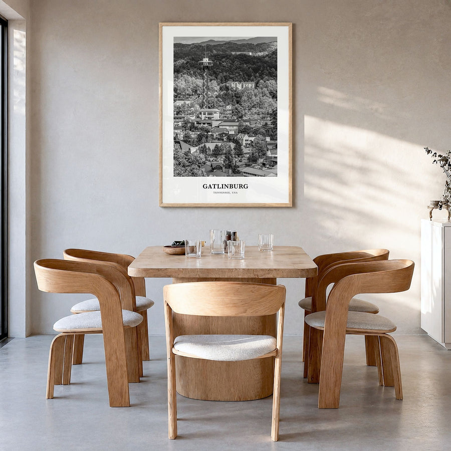 Gatlinburg Classic Poster in a natural wood frame, hanging in a dining room