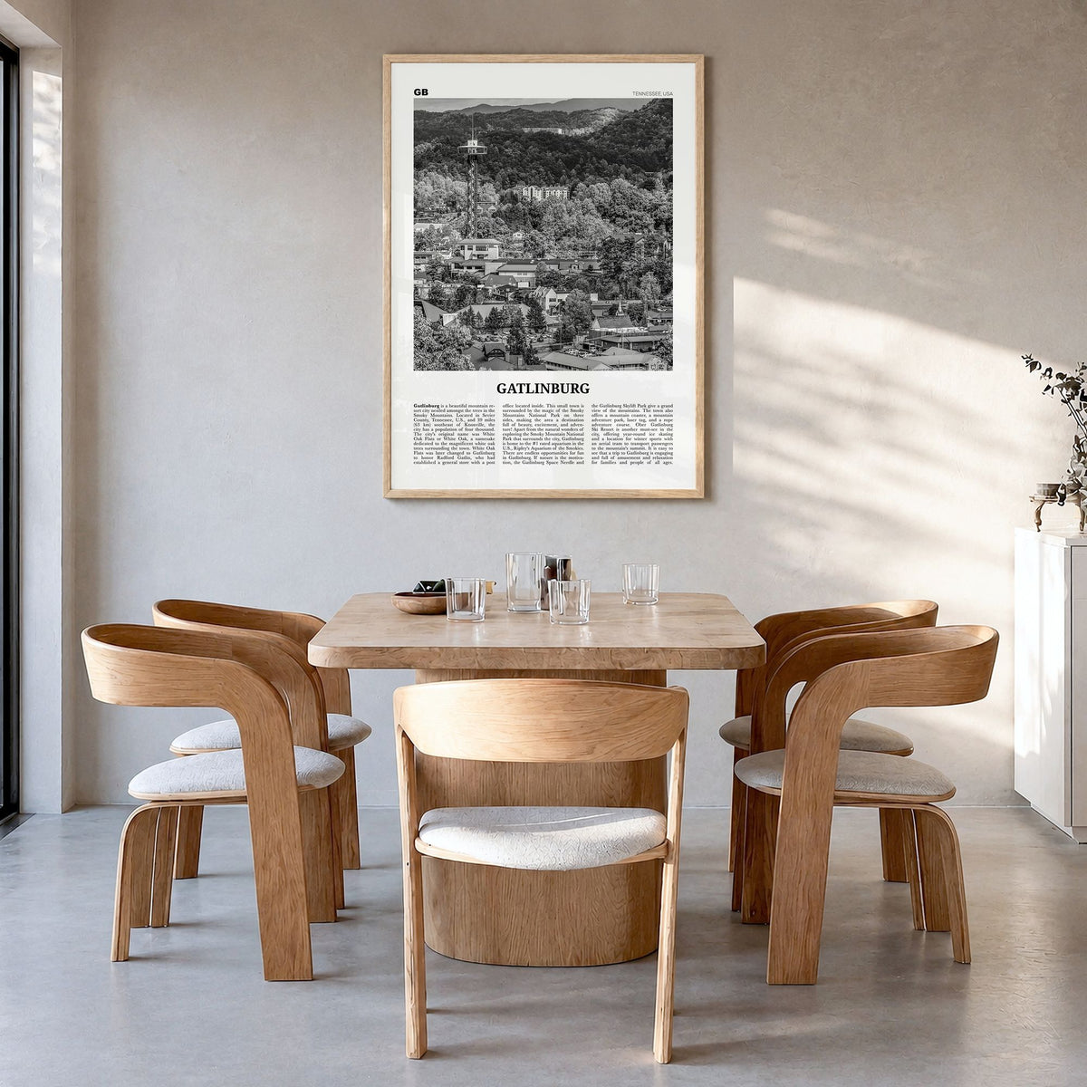 Gatlinburg Newspaper Poster in a natural wood frame, hanging in a dining room