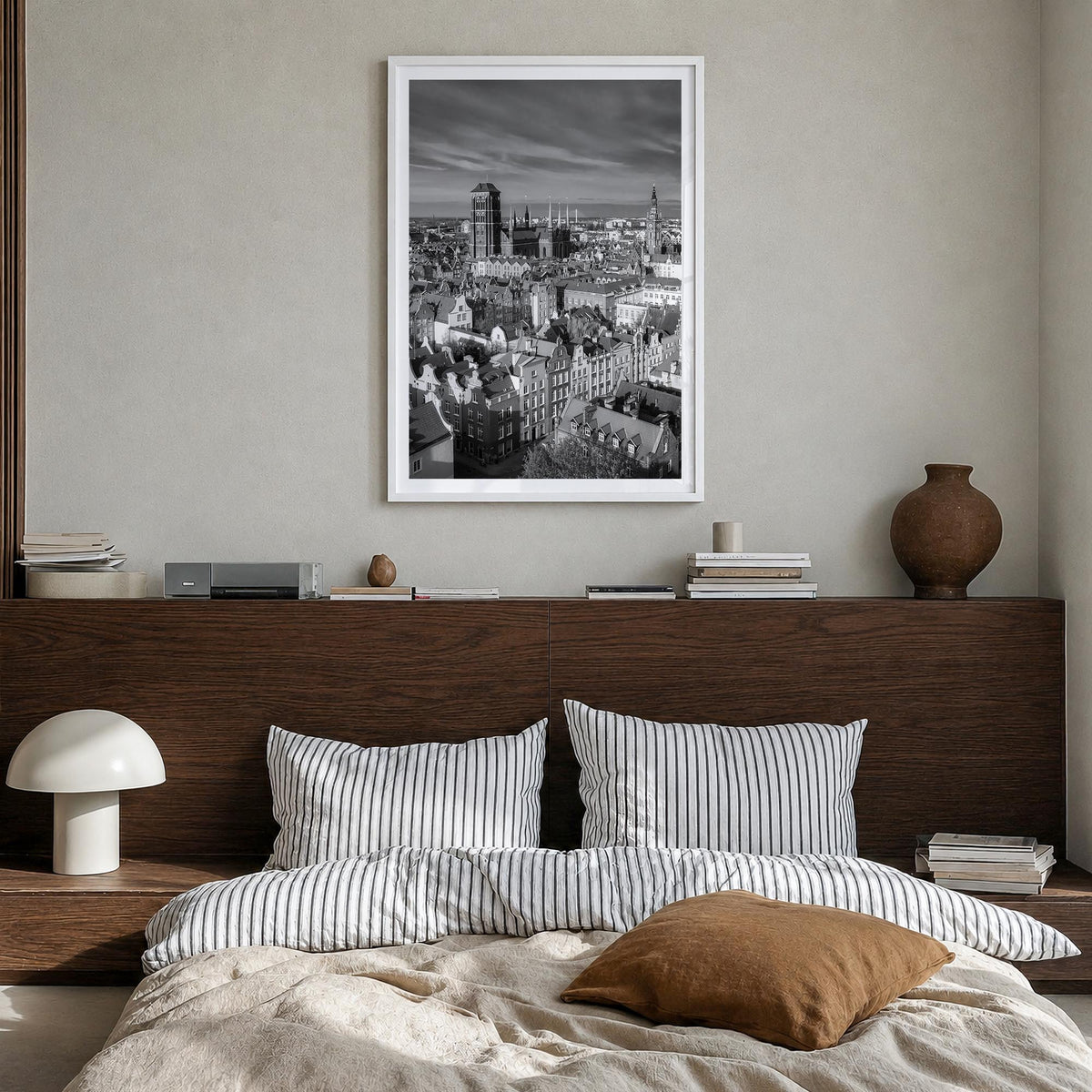 Gdańsk black & white photo poster of Poland – vertical wall art in white wood frame with white border, hanging on wall