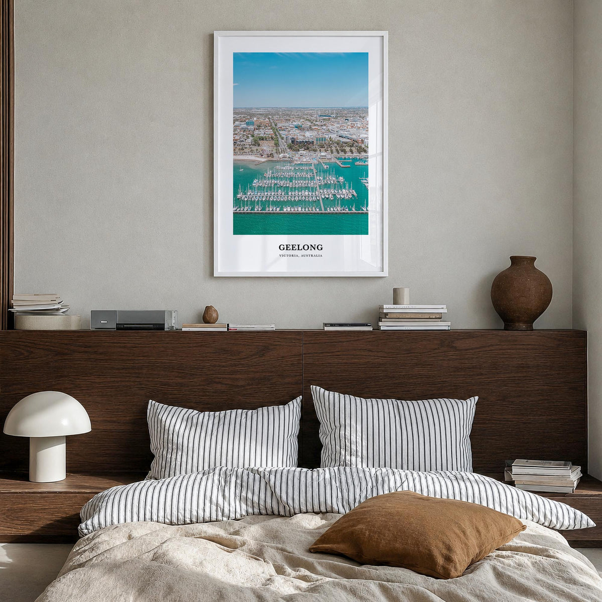 Geelong colorful classic poster of Australia – vertical wall art in white wood frame, hanging on wall