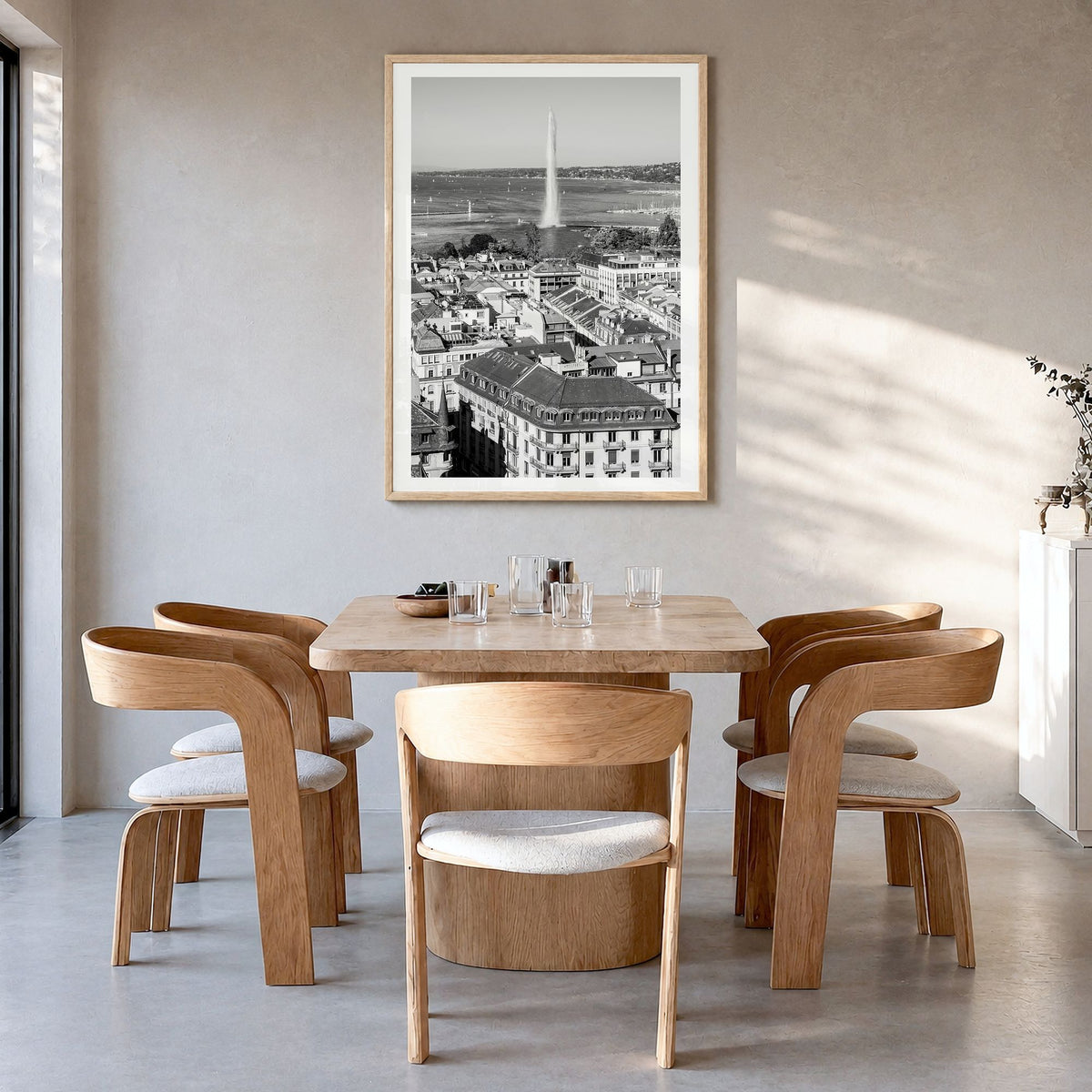 Geneva Photo Poster in a natural wood frame, hanging in a dining room, white border