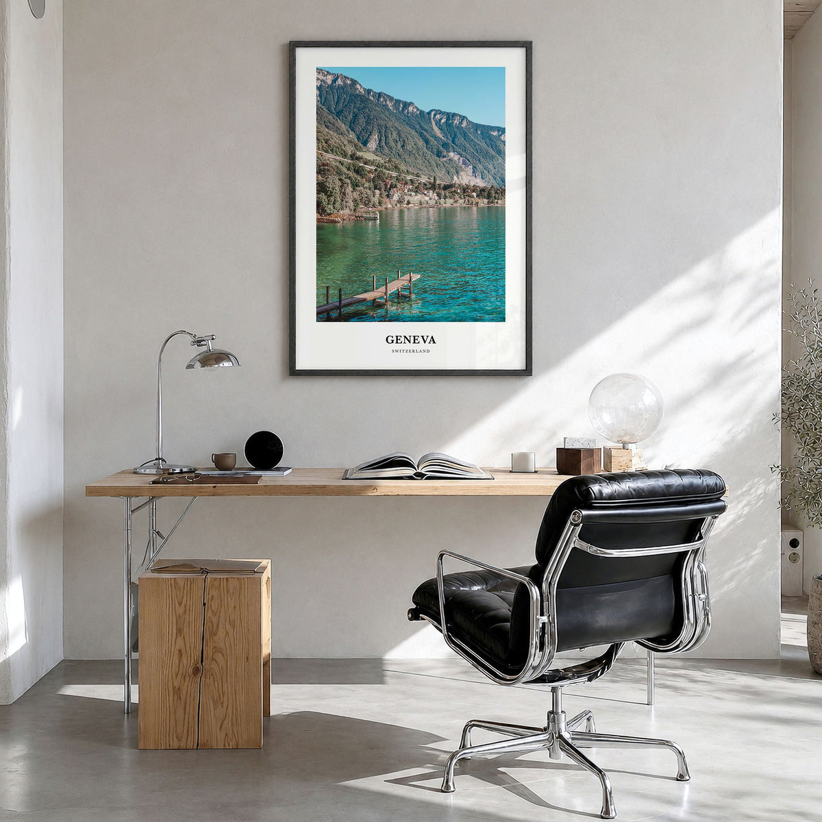 Geneva Classic Poster in a black wood frame, hanging in a bright home office