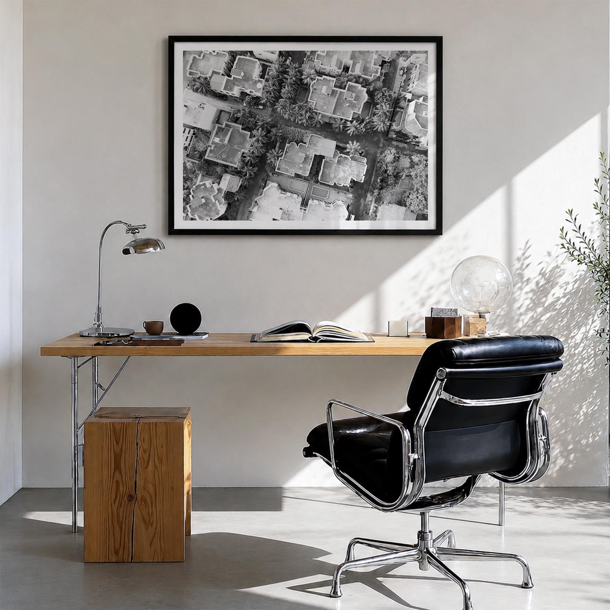 Ghana black & white photo poster of Africa – horizontal wall art in black wood frame with white border, hanging on wall
