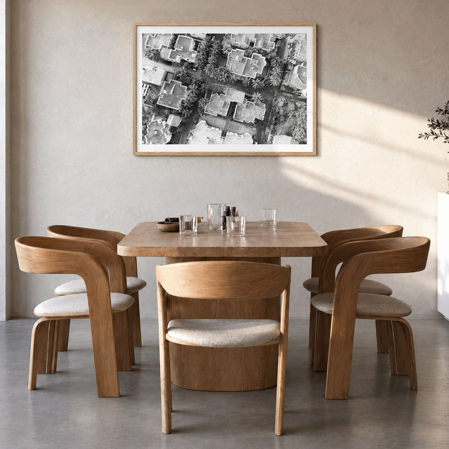 Ghana Photo Poster in a natural wood frame, hanging in a dining room, white border