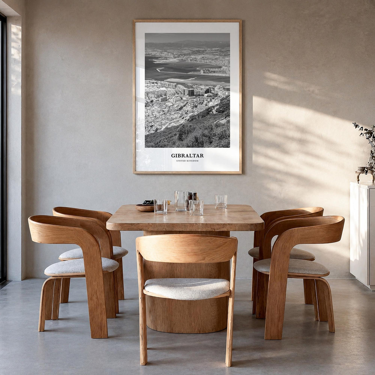 Gibraltar black & white classic poster of Europe – vertical wall art in natural wood frame, hanging on wall
