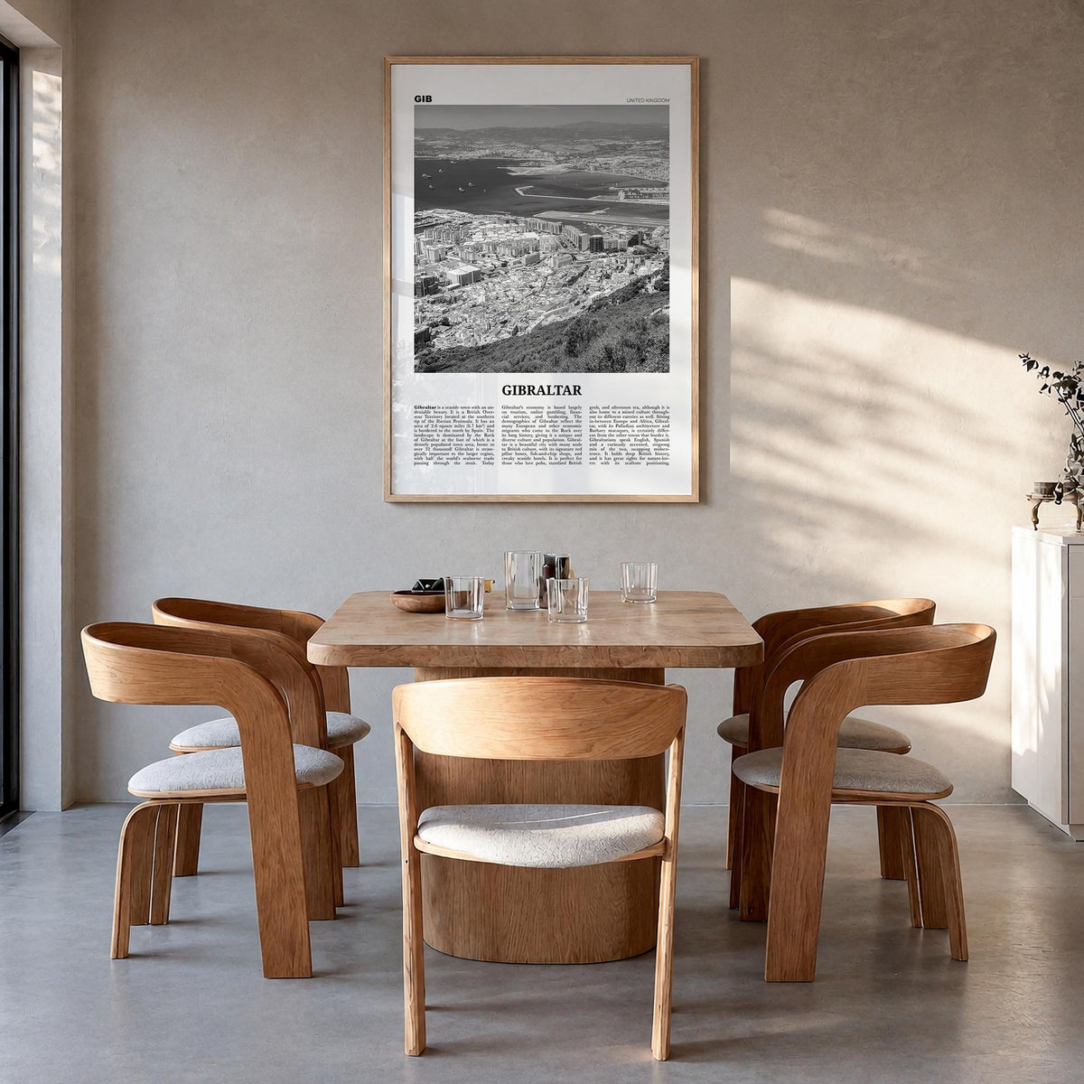 Gibraltar black & white newspaper poster of Europe – vertical wall art in natural wood frame, hanging on wall