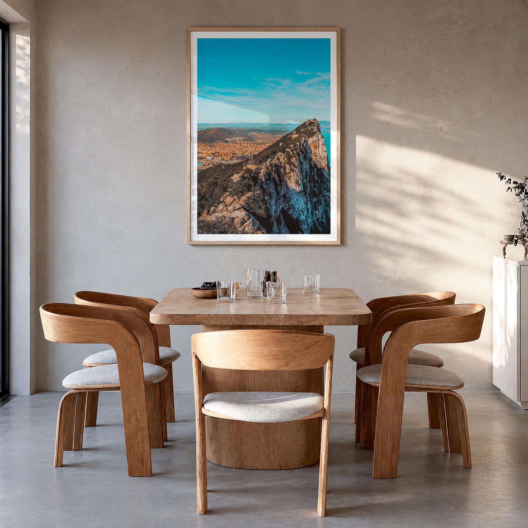 Gibraltar colorful photo poster of Europe – vertical wall art in natural wood frame with white border, hanging on wall