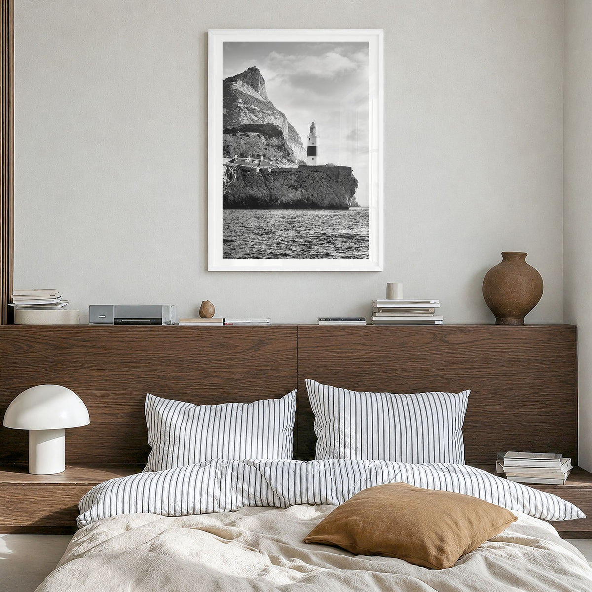Gibraltar Photo Poster in a white wood frame, hanging in a bedroom, white border