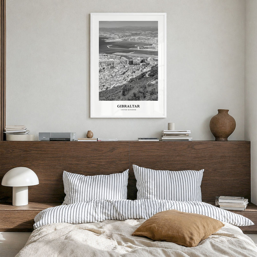 Gibraltar Classic Poster in a white wood frame, hanging in a bedroom