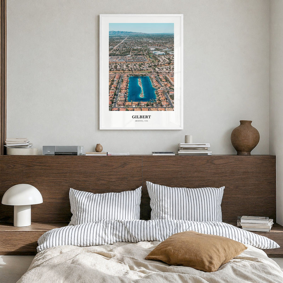 Gilbert Classic Poster in a white wood frame, hanging in a bedroom