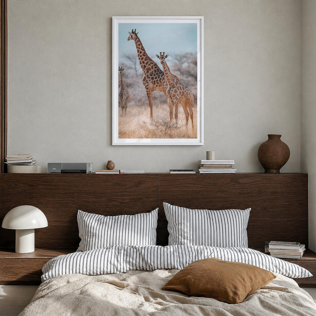 Giraffe no. 1 colorful photo poster – vertical wall art in white wood frame with white border, hanging on wall