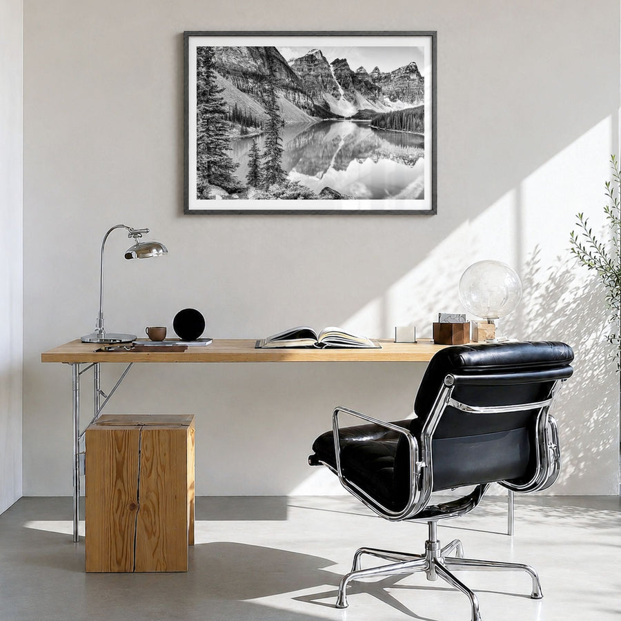 Glacier National Park Photo Poster in a black wood frame, hanging in a bright home office, white border