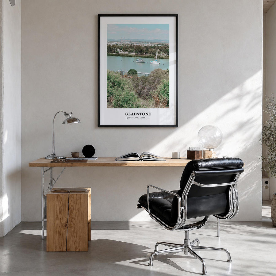 Gladstone colorful classic poster of Australia – vertical wall art in black wood frame, hanging on wall