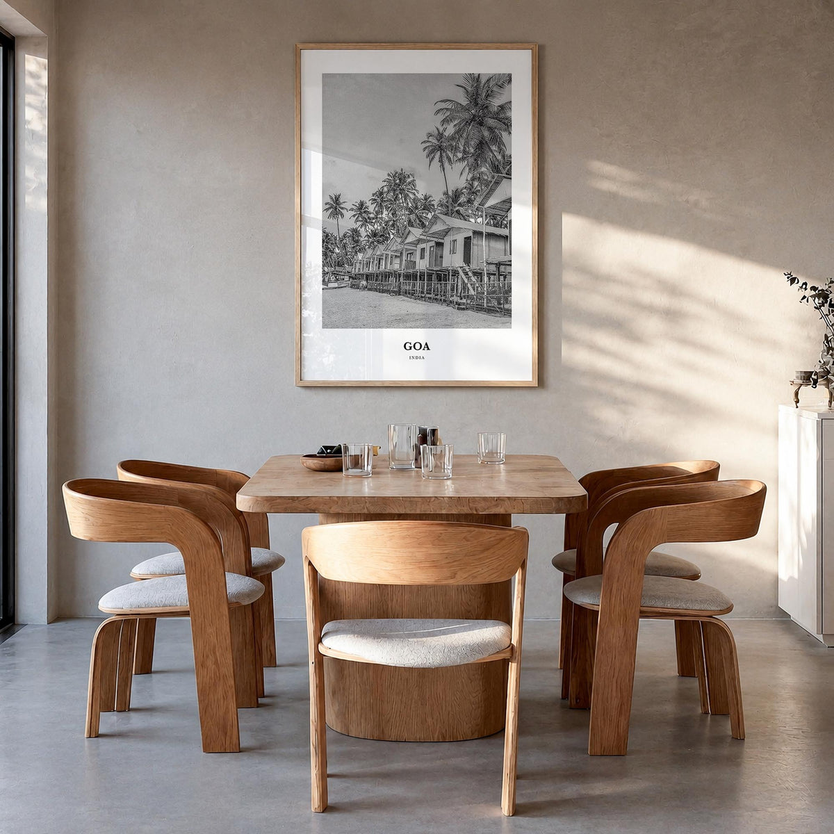 Goa no. 2 black & white classic poster of India – vertical wall art in natural wood frame, hanging on wall