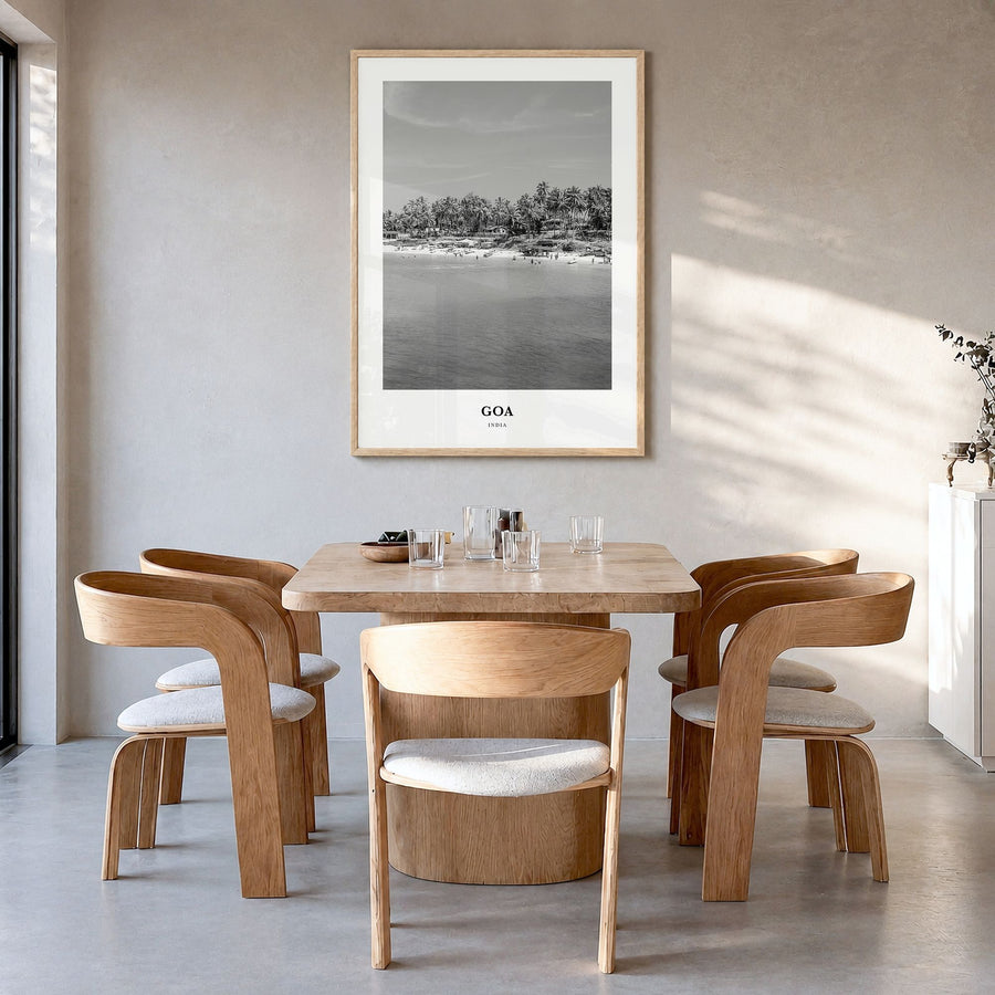 Goa Classic No 1 Poster in a natural wood frame, hanging in a dining room