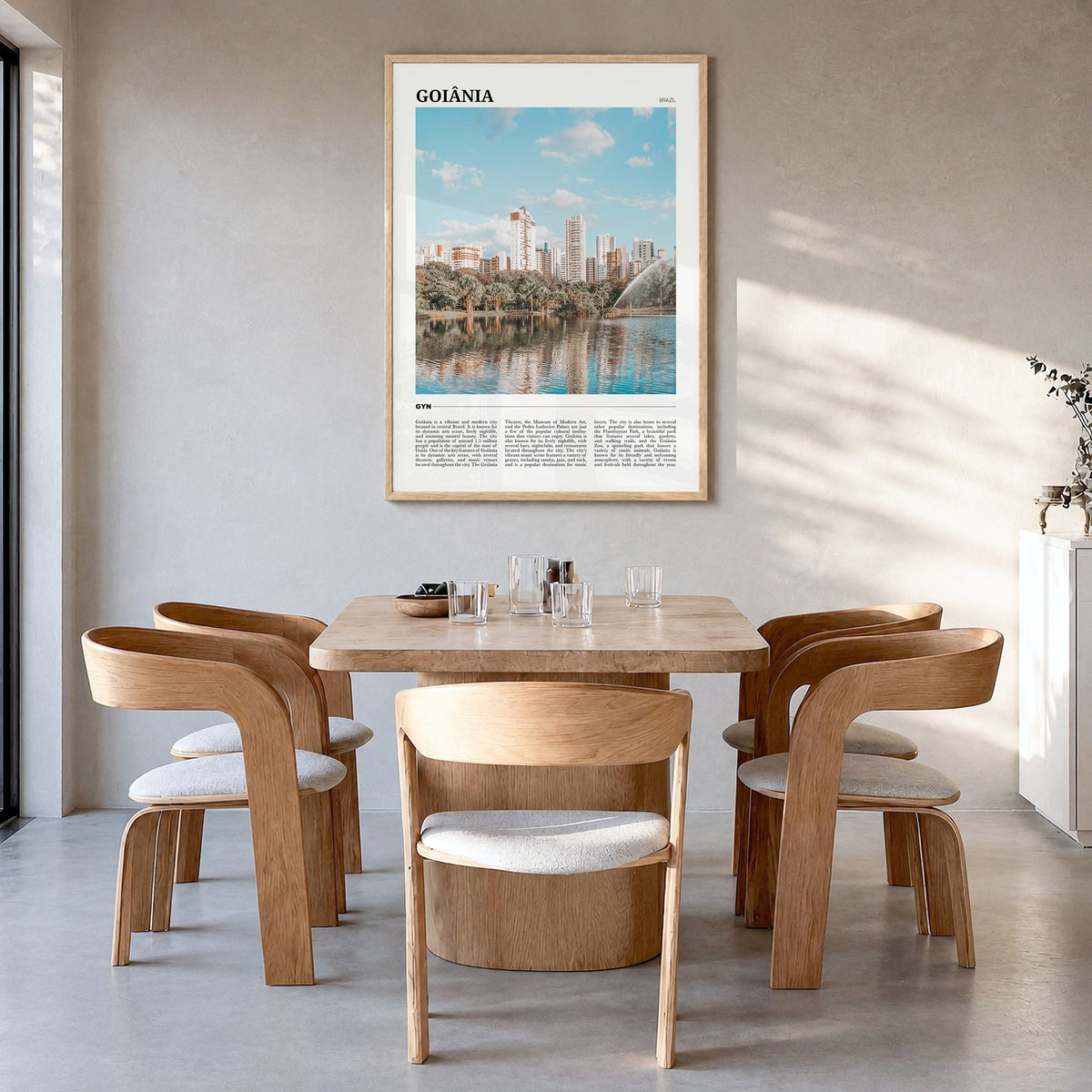 Goiânia Travel Poster in a natural wood frame, hanging in a dining room