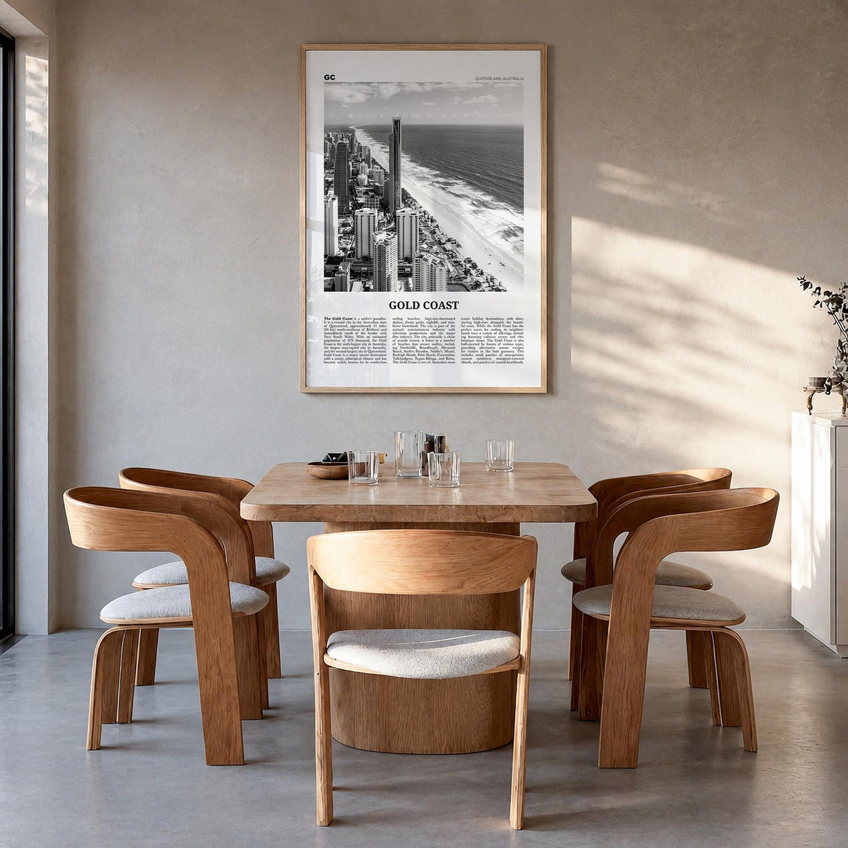 Gold Coast black & white newspaper poster of Queensland, Australia – vertical wall art in natural wood frame, hanging on wall