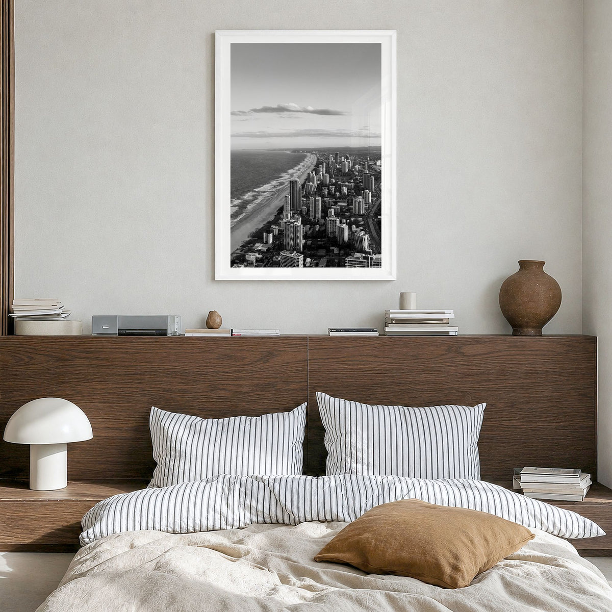 Gold Coast Photo Poster in a white wood frame, hanging in a bedroom, white border