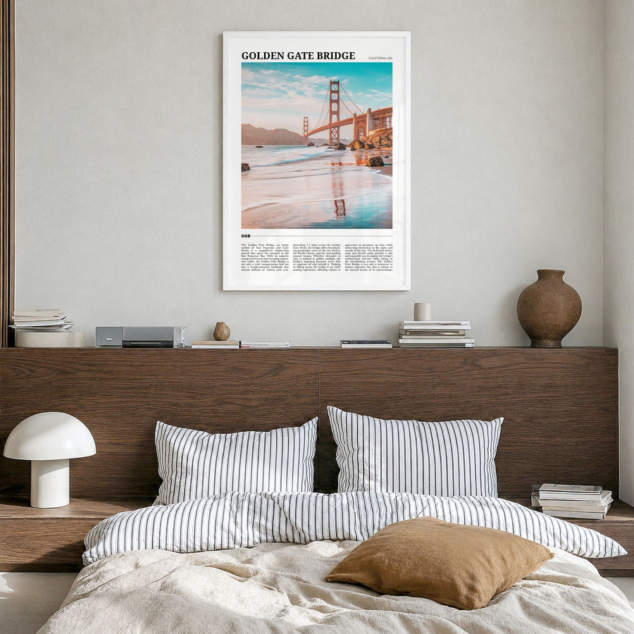 Golden Gate Bridge Travel Poster in a white wood frame, hanging in a bedroom