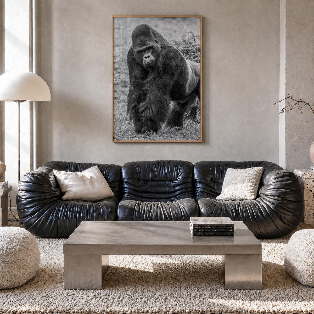 Gorilla black & white photo poster – vertical wall art in natural wood frame, hanging on wall