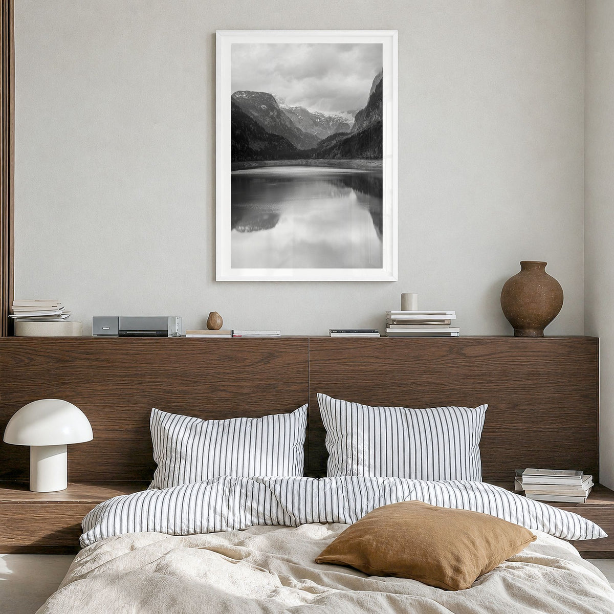 Gosausee Lake Photo Poster in a white wood frame, hanging in a bedroom, white border