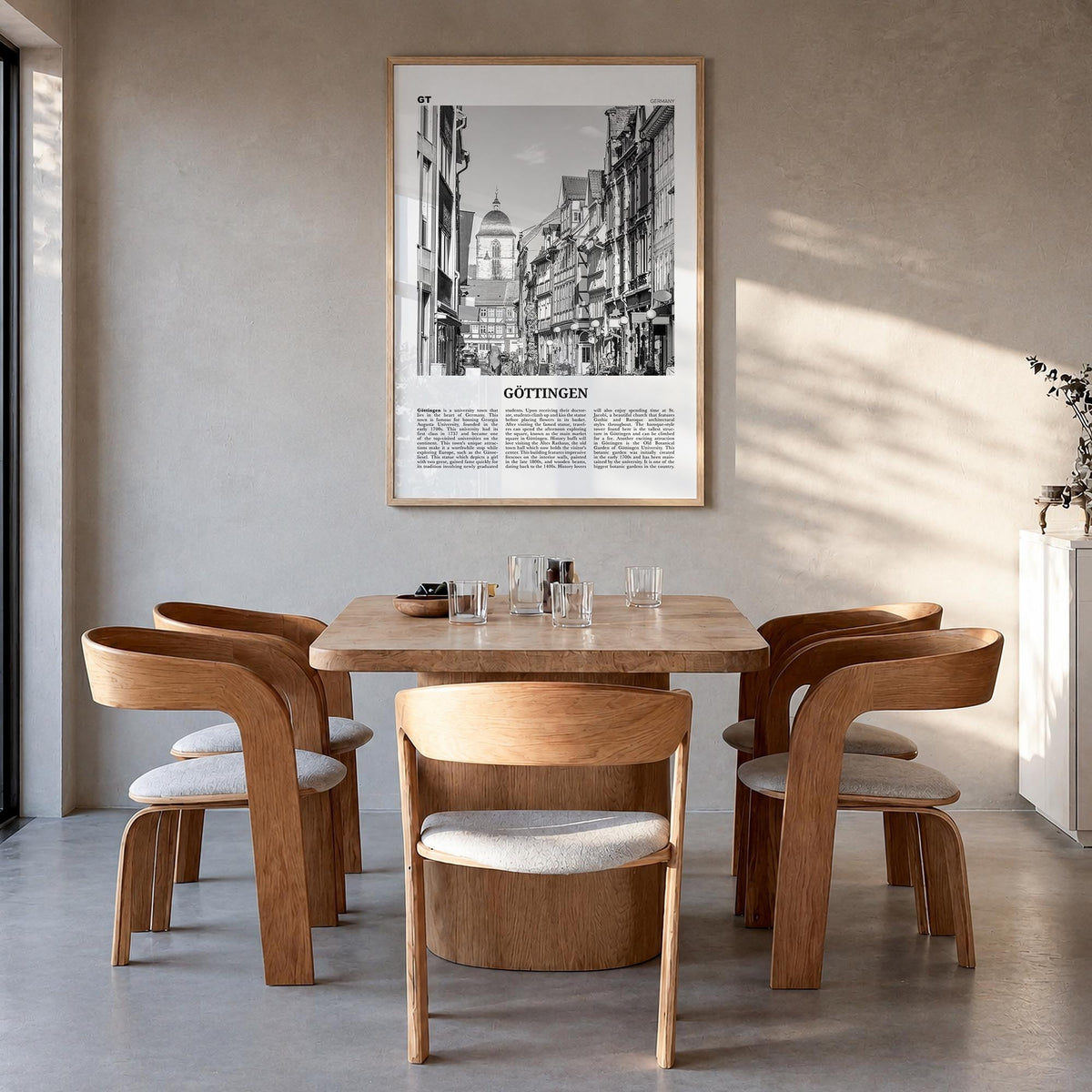 Göttingen black & white newspaper poster of Germany – vertical wall art in natural wood frame, hanging on wall