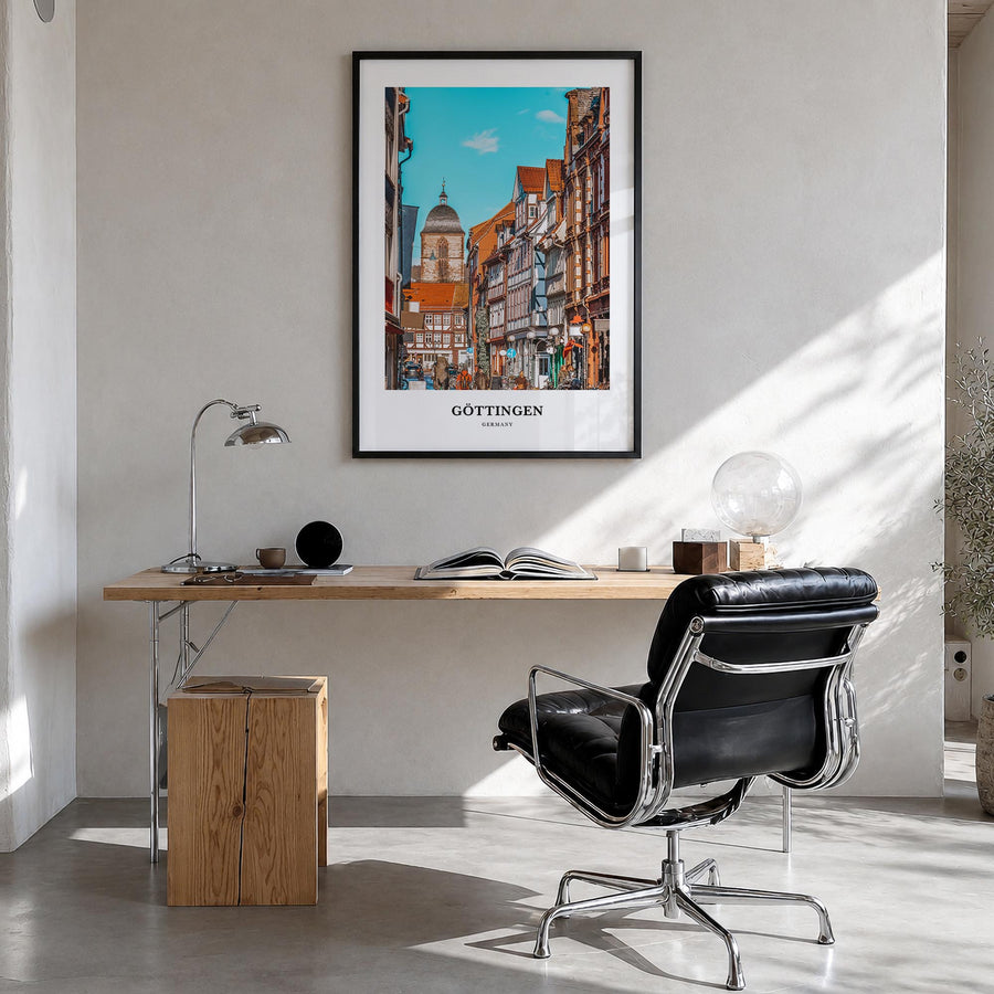 Göttingen colorful classic poster of Germany – vertical wall art in black wood frame, hanging on wall