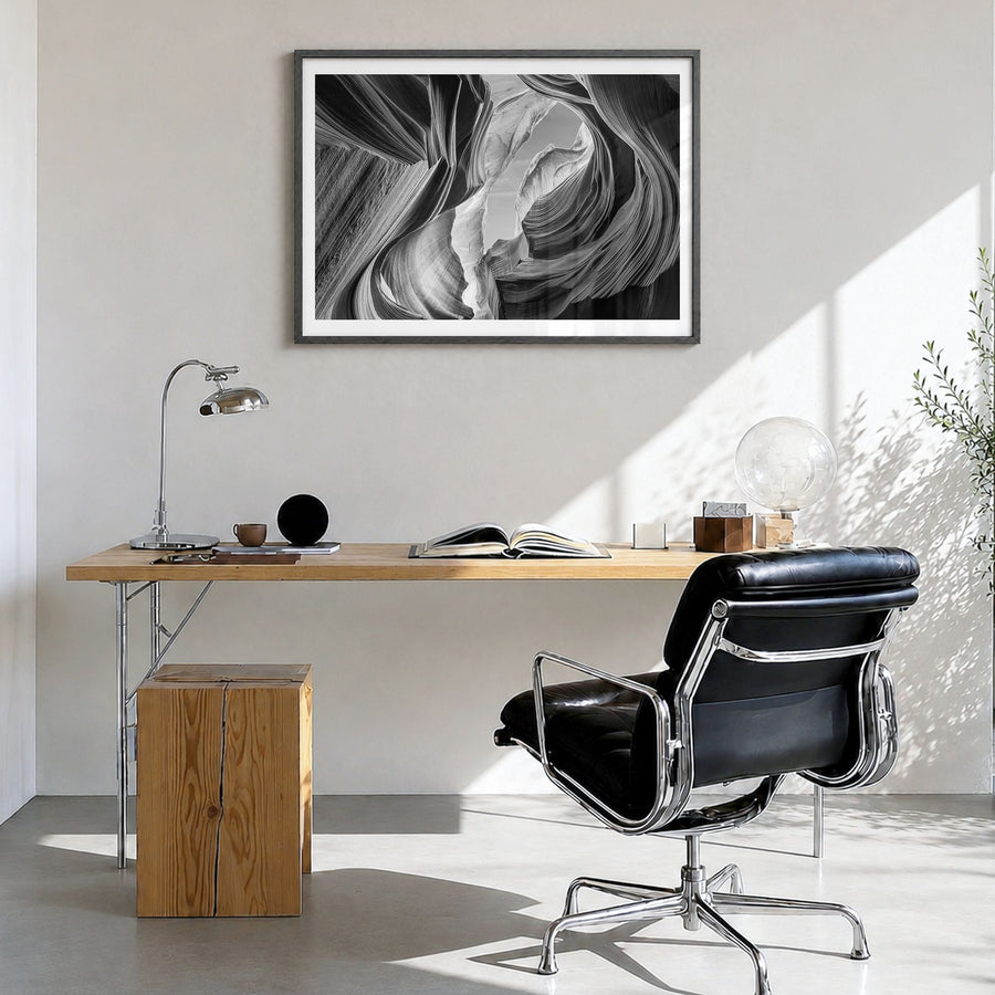 Grand Canyon Photo Poster in a black wood frame, hanging in a bright home office, white border