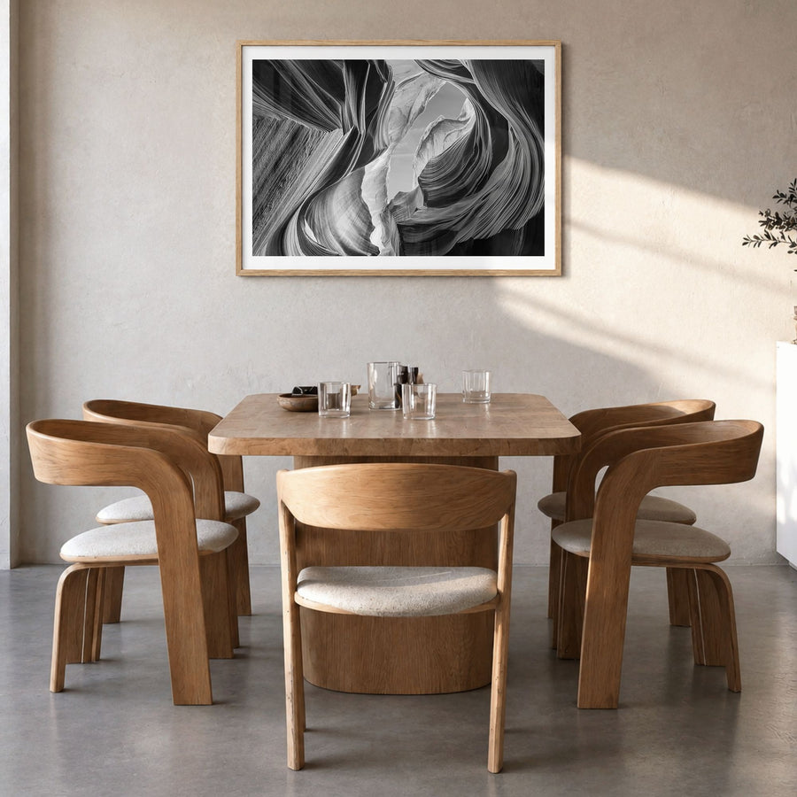 Grand Canyon Photo Poster in a natural wood frame, hanging in a dining room, white border