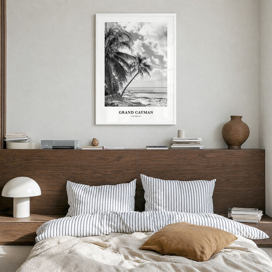 Grand Cayman Classic Poster in a white wood frame, hanging in a bedroom