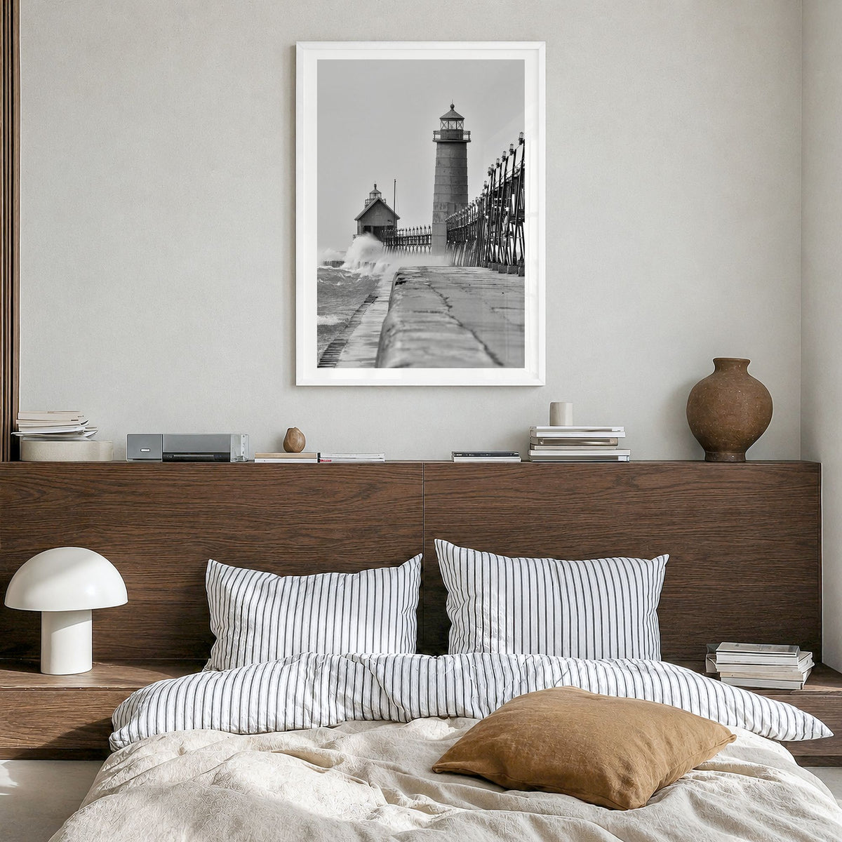 Grand Haven Photo Poster in a white wood frame, hanging in a bedroom, white border
