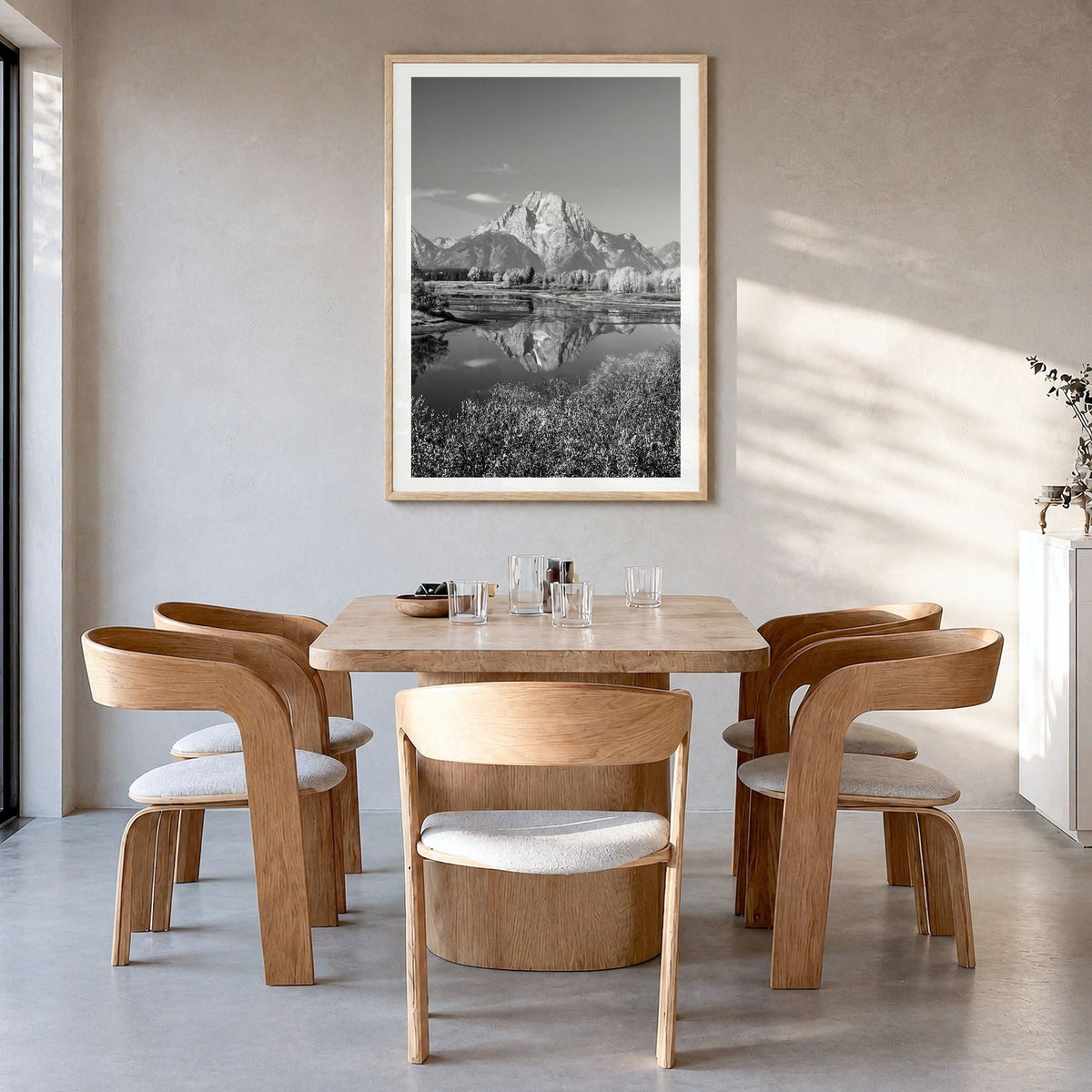 Grand Teton National Park Photo No 1 Poster in a natural wood frame, hanging in a dining room, white border
