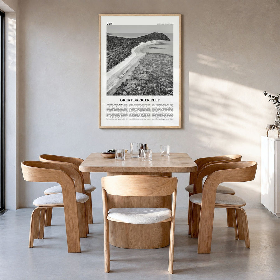 Great Barrier Reef Newspaper Poster in a natural wood frame, hanging in a dining room
