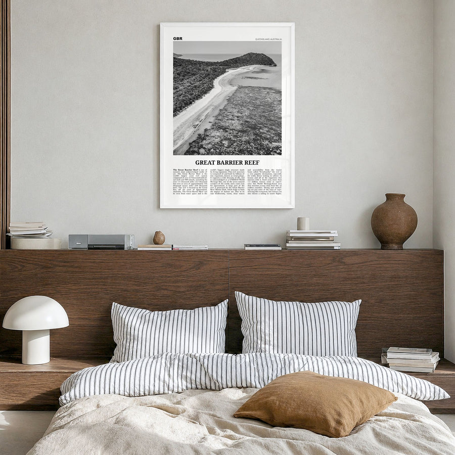 Great Barrier Reef Newspaper Poster in a white wood frame, hanging in a bedroom