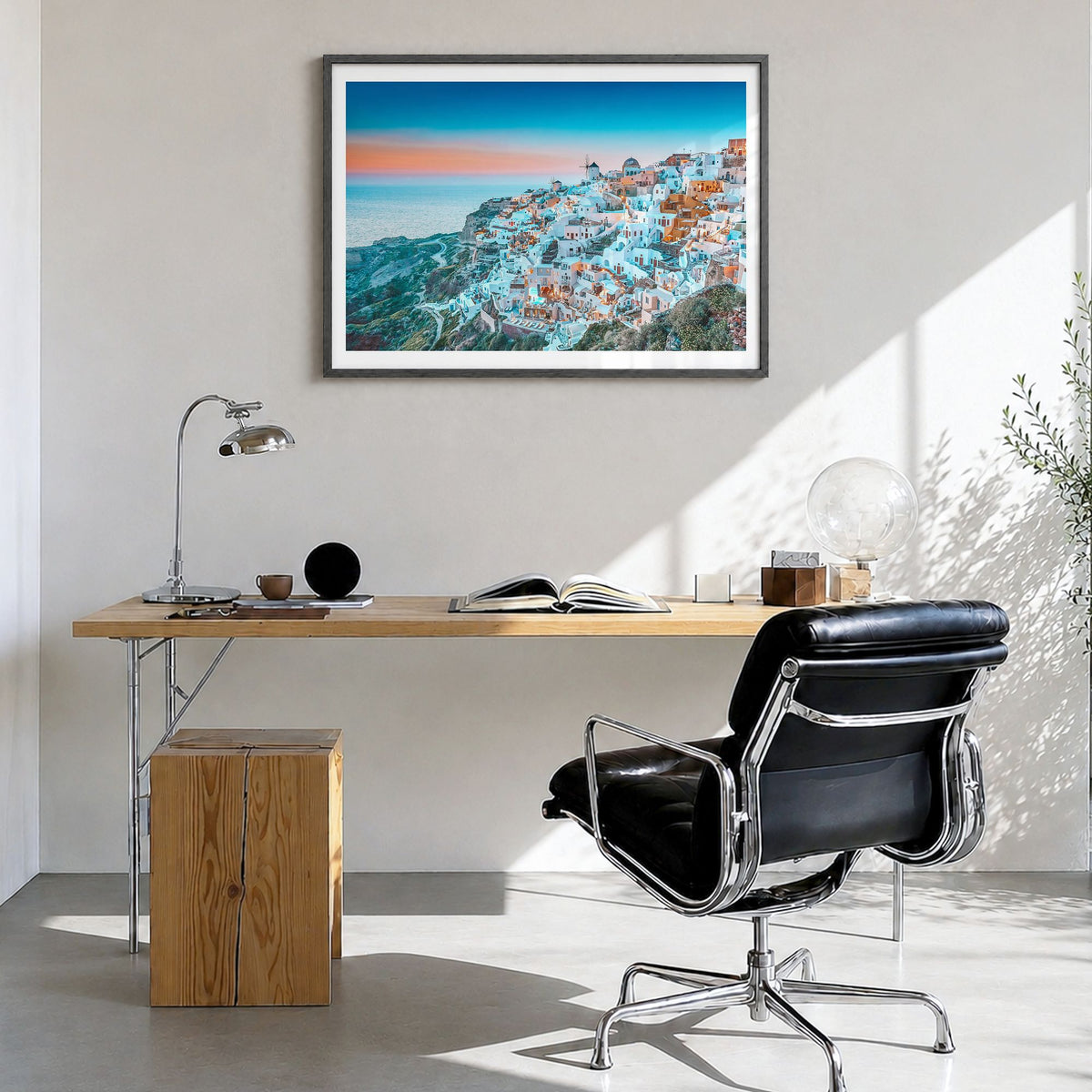 Greece Photo Poster in a black wood frame, hanging in a bright home office, white border