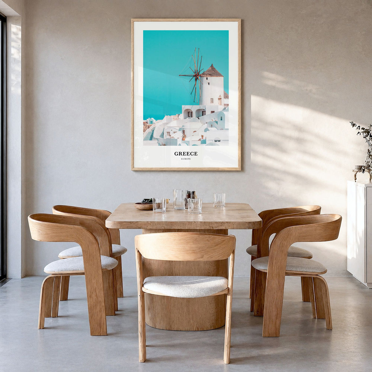 Greece Classic Poster in a natural wood frame, hanging in a dining room