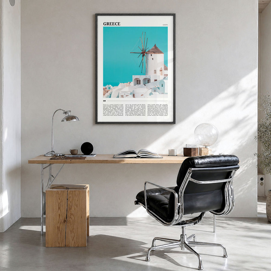 Greece Travel Poster in a black wood frame, hanging in a bright home office