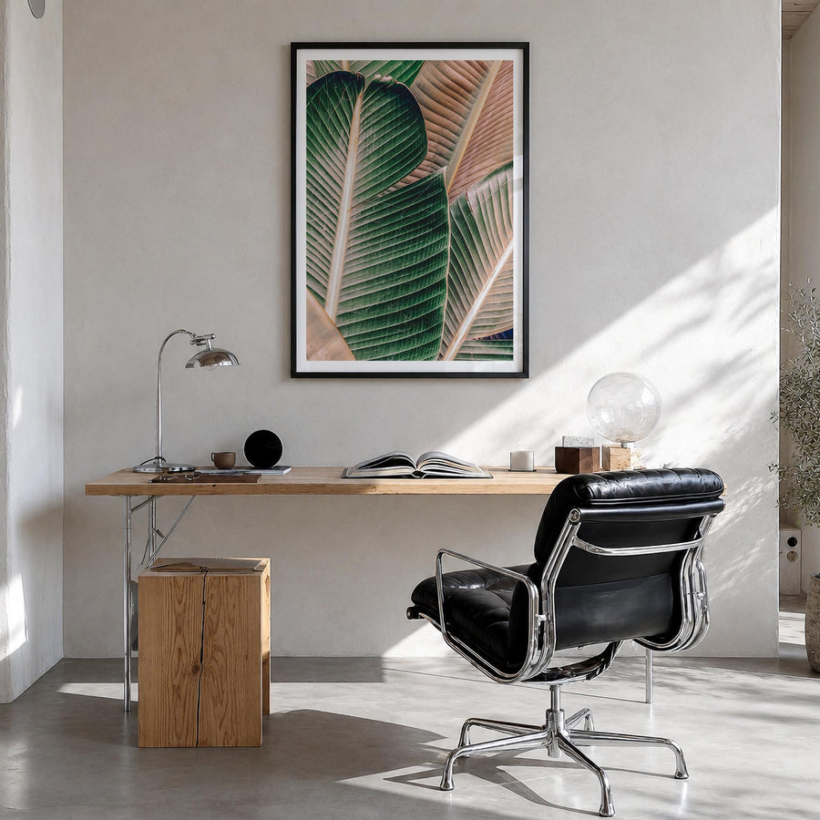 Green Palm Leaf colorful photo poster – vertical wall art in black wood frame with white border, hanging on wall