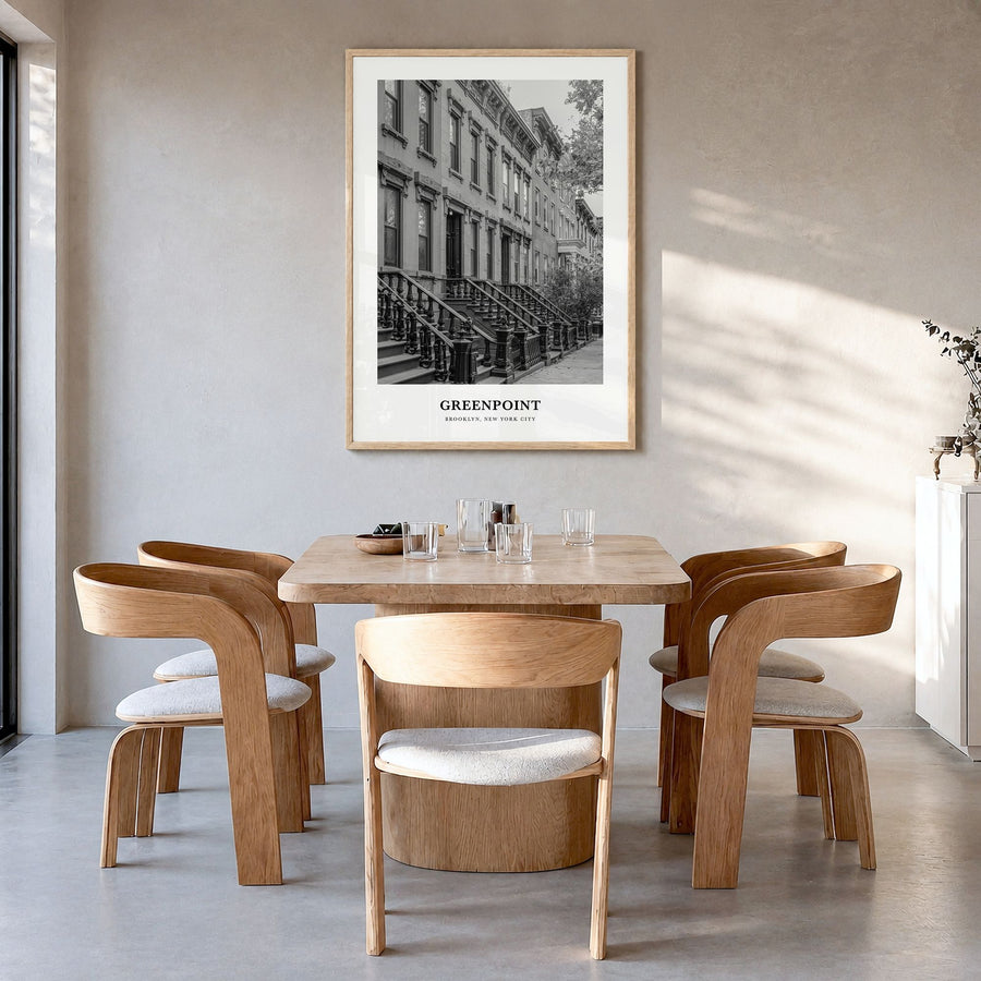 Greenpoint Classic Poster in a natural wood frame, hanging in a dining room