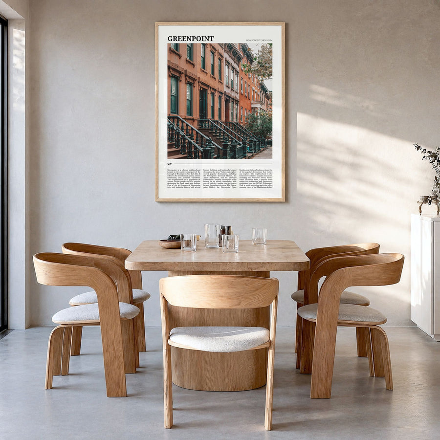Greenpoint Travel Poster in a natural wood frame, hanging in a dining room