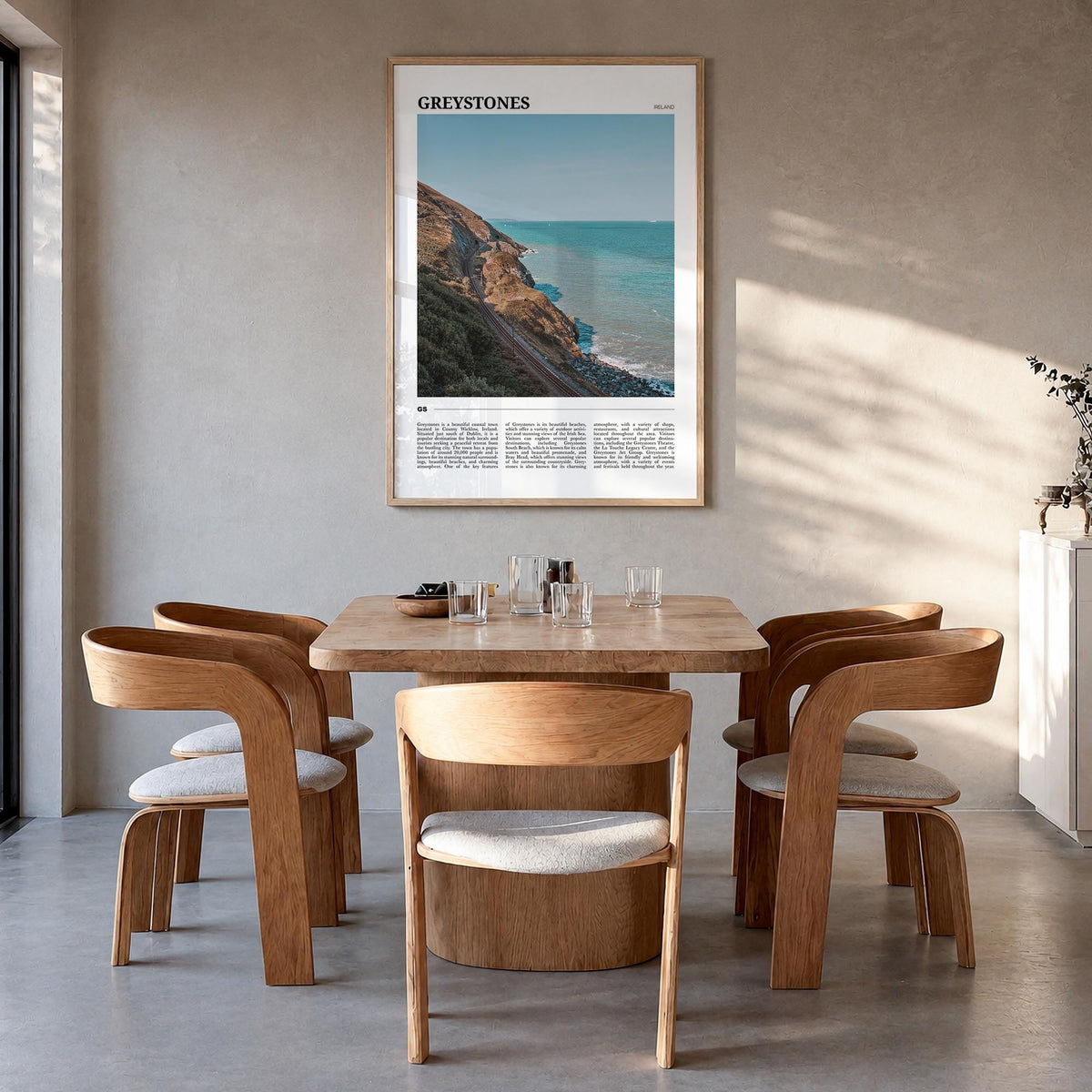 Greystones colorful travel poster of Ireland – vertical wall art in natural wood frame, hanging on wall