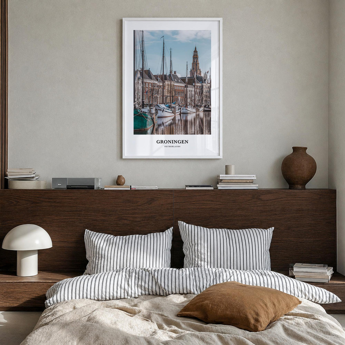 Groningen colorful classic poster of Netherlands – vertical wall art in white wood frame, hanging on wall