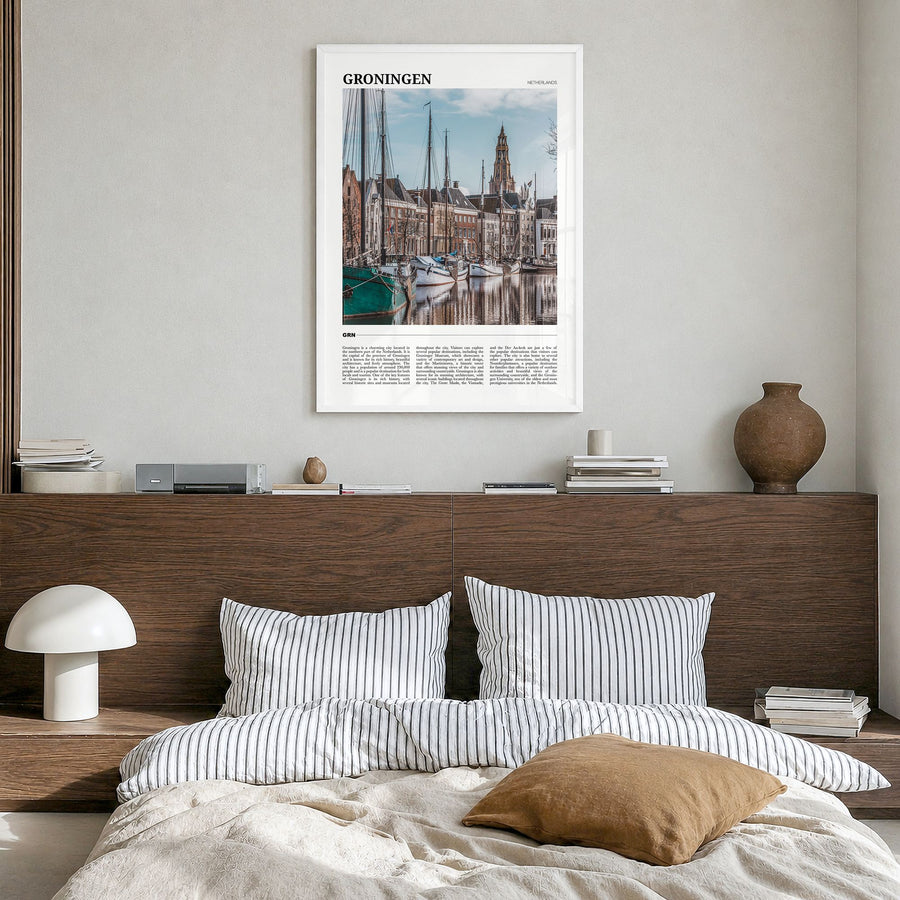 Groningen Travel Poster in a white wood frame, hanging in a bedroom