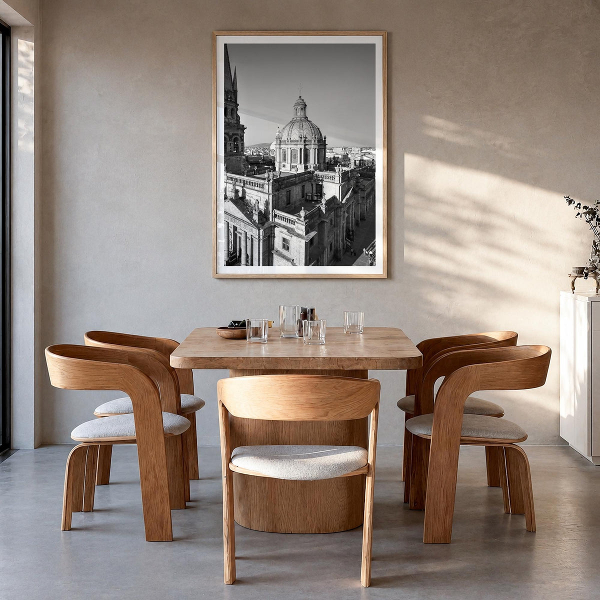 Guadalajara black & white photo poster of Mexico – vertical wall art in natural wood frame with white border, hanging on wall