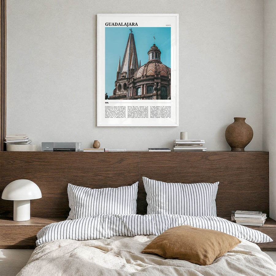 Guadalajara Travel Poster in a white wood frame, hanging in a bedroom