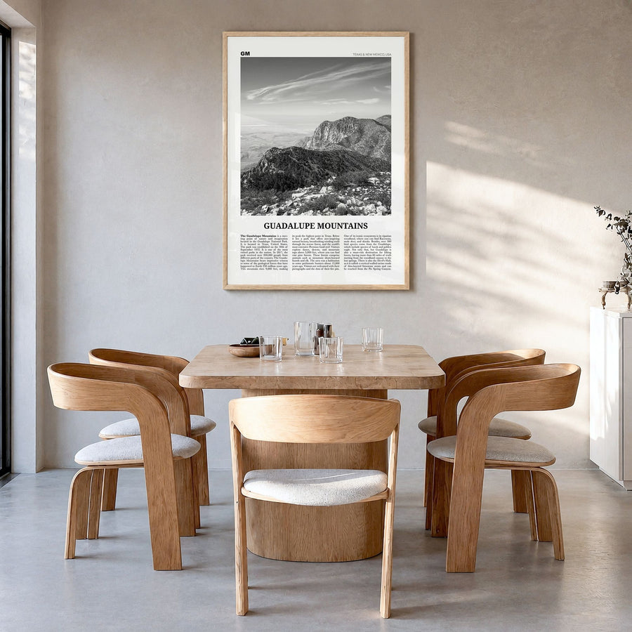Guadalupe Mountains Newspaper Poster in a natural wood frame, hanging in a dining room